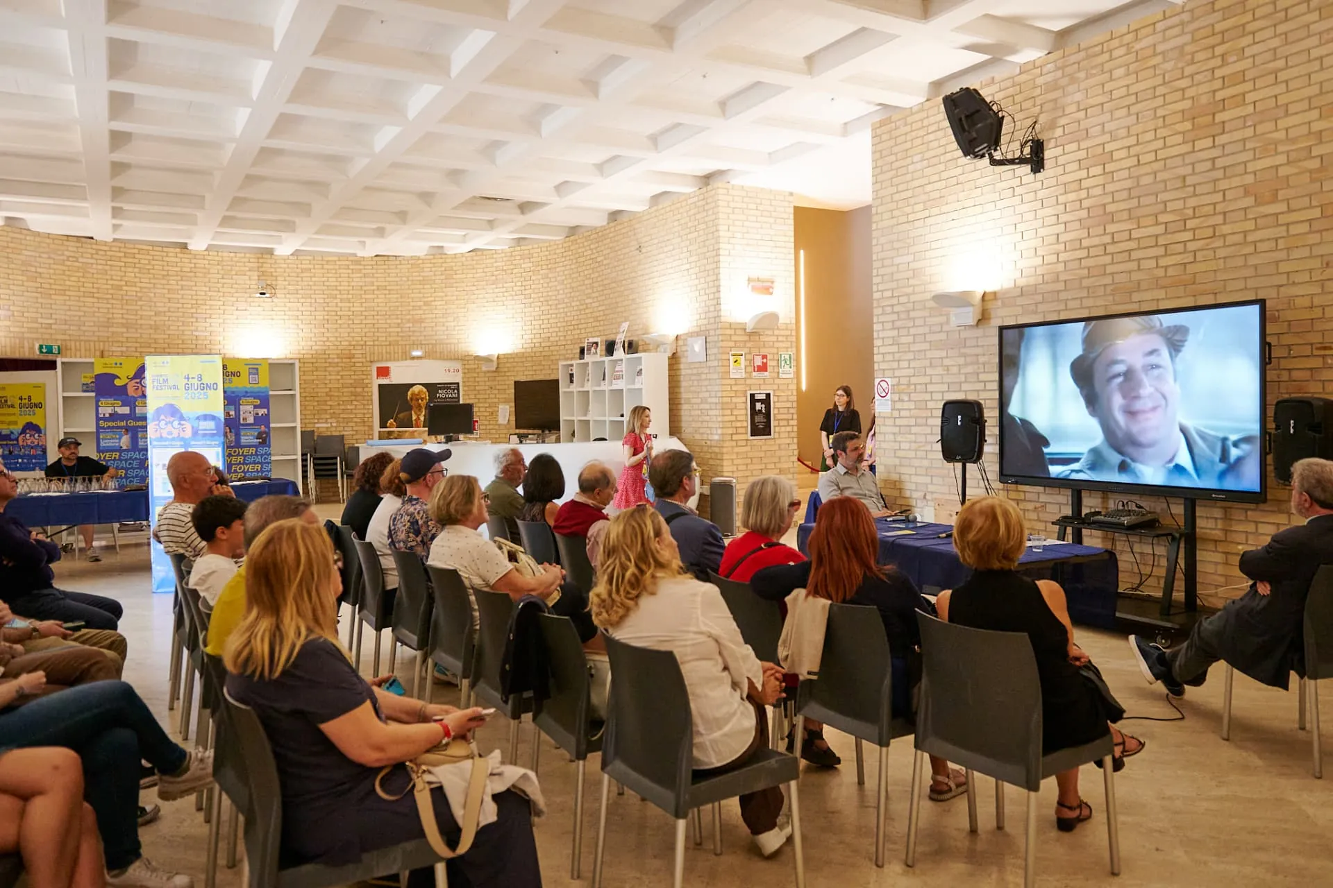 Incontro nel Foyer Space con proiezione